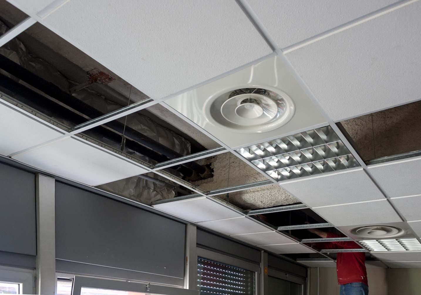 dreamstime_m_109952957 Suspended ceiling repair